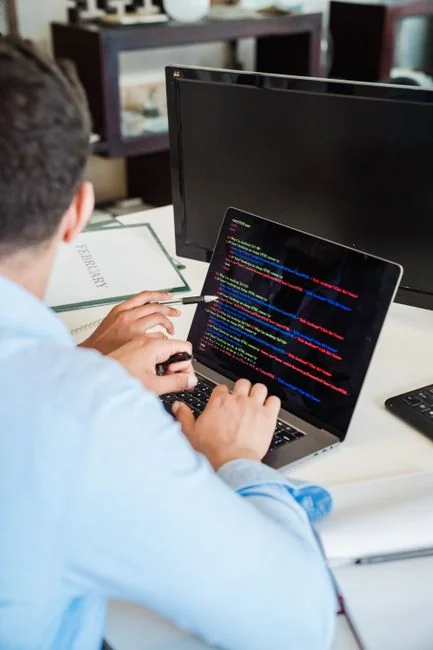 A tablet with a financial website open, alongside a white keyboard and mouse. Ideal for tech-theme stock images.